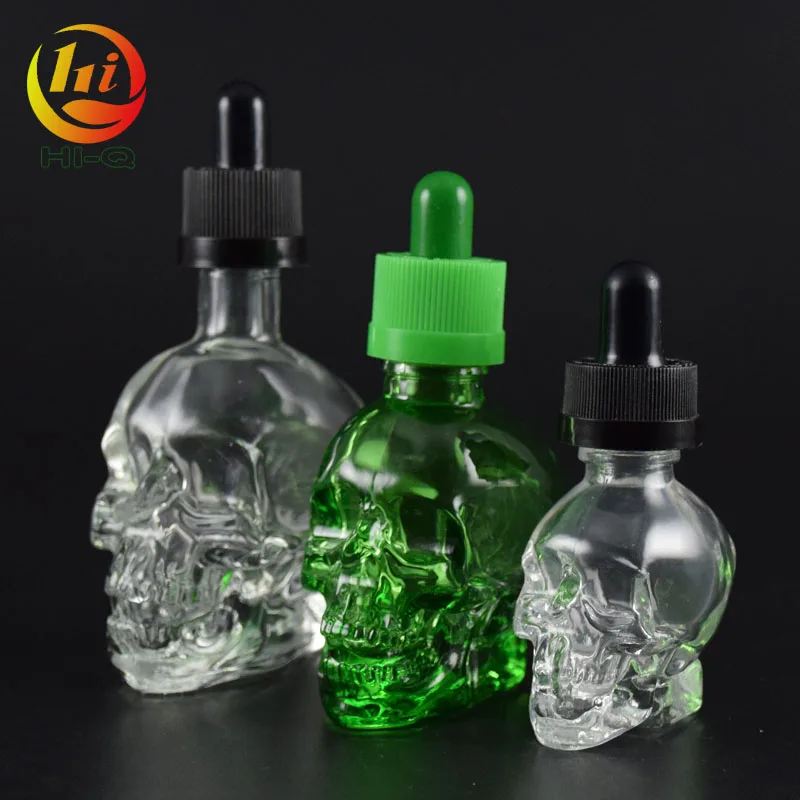 unique shape glass liquid bottle 15ml 30ml 50ml clear skull glass dropper bottle