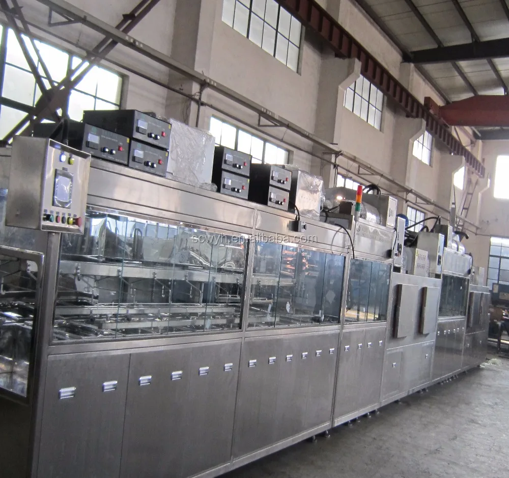 Automatic cleaning and hard coating machine for optical lens