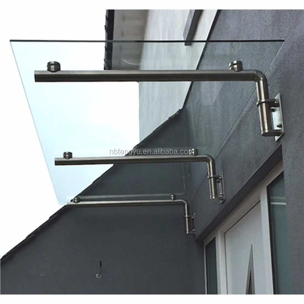 glass door canopy with tubular brackets