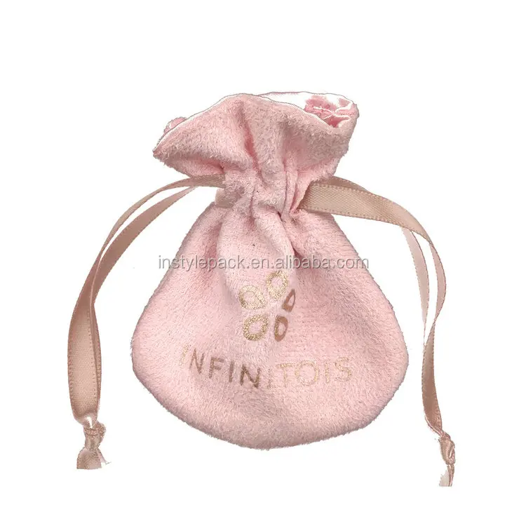 small pink velvet jewelry pouch with tassel drawstring
