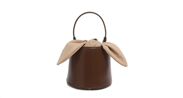 Niche design leather handbag bucket bag female 2019 new bow shoulder slung mobile handbag