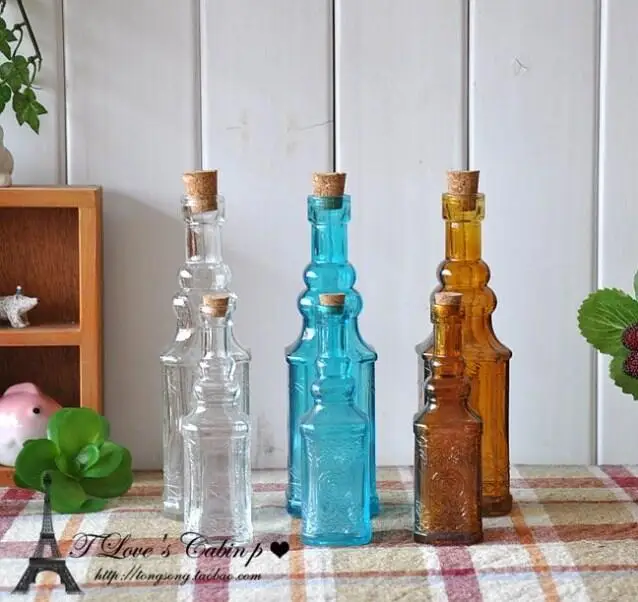 Vintage Square Bottom Glass Wine Bottle for Packing Wine With Cork Lid and Decorative Sculptured Pattern