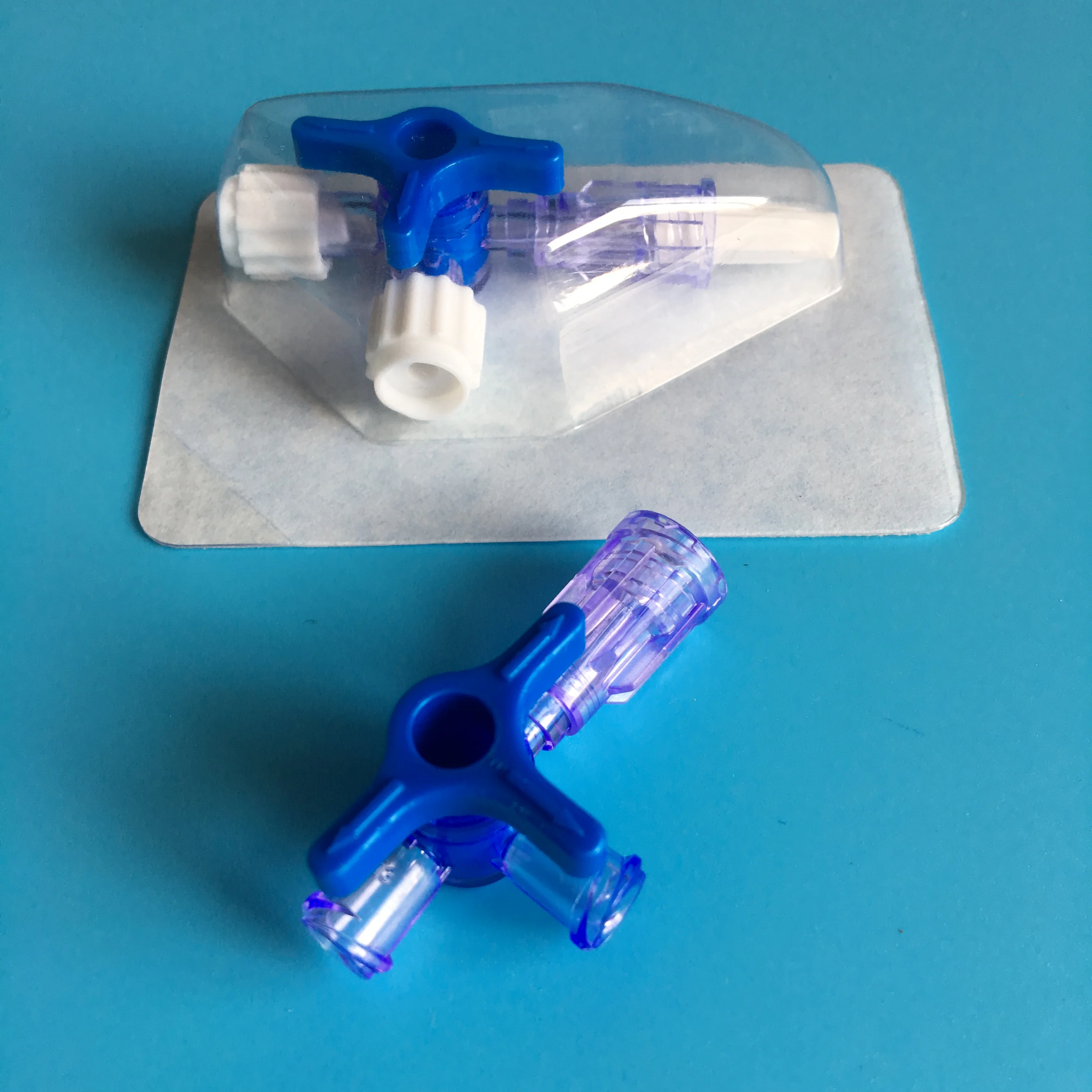 Three way stopcock with two female luer lock one male luer lock