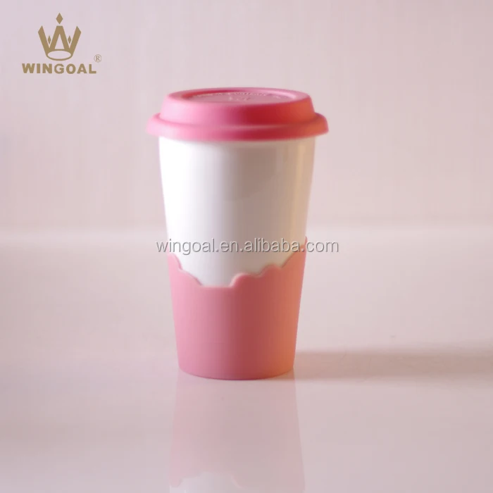 ceramic double wall travel mug with silicone lid and sleeve