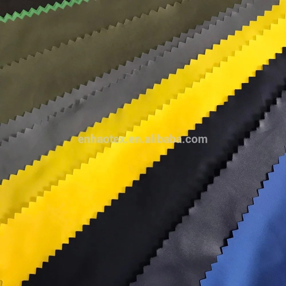 230T 300T Polyester Taffeta NS OIL Cire Fabric For Garment