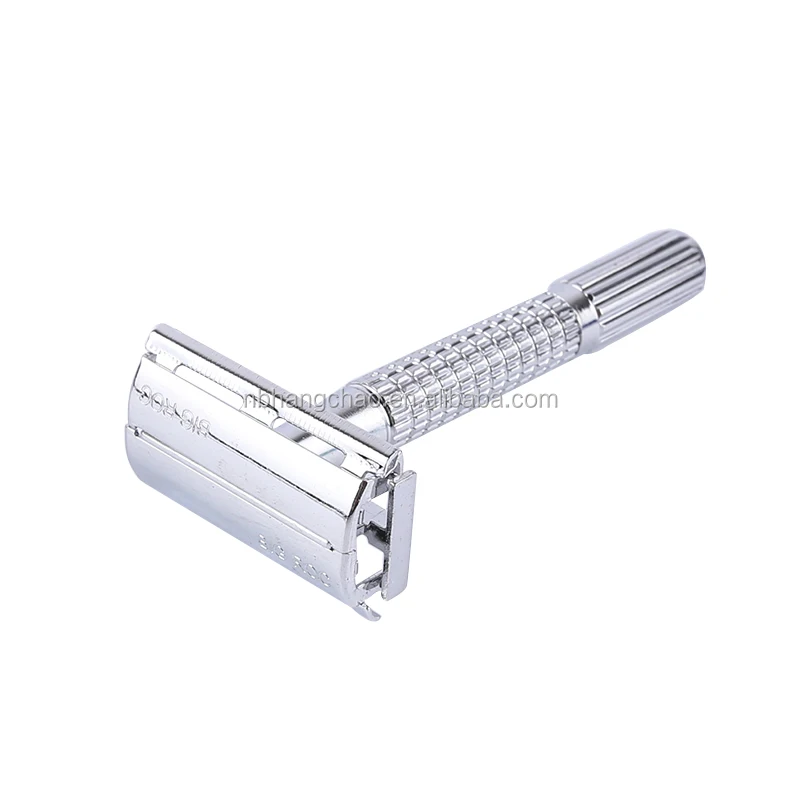 Twist to open butterfly style safety razor