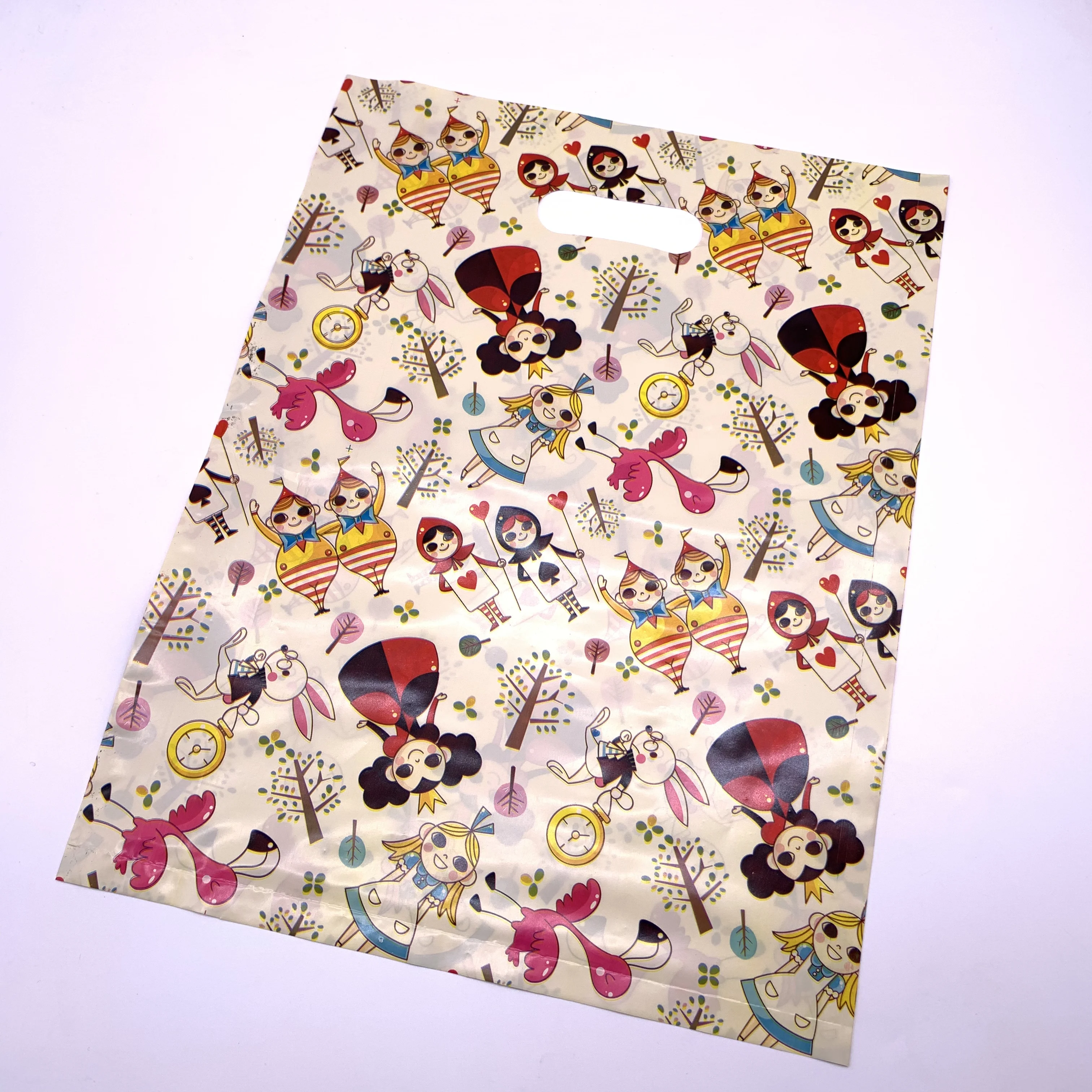 Custom made handle die cut plastic bags