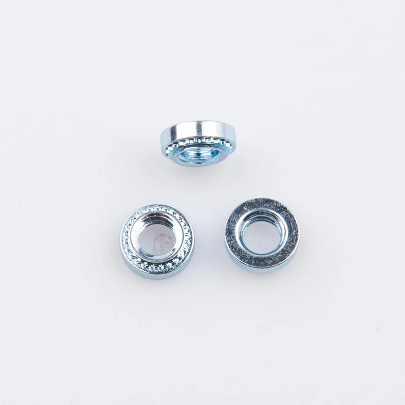 China Manufacturer Carbon Steel Zinc Plated Clinching Nuts