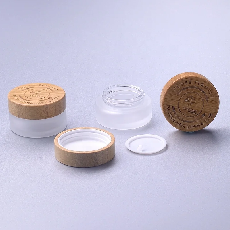 bamboo cosmetic packaging bamboo child resistant child proof cap frosted glass jar with bamboo lid