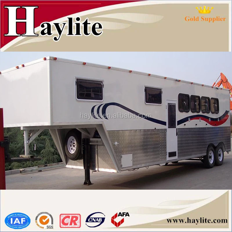 white gooseneck horse float with roof