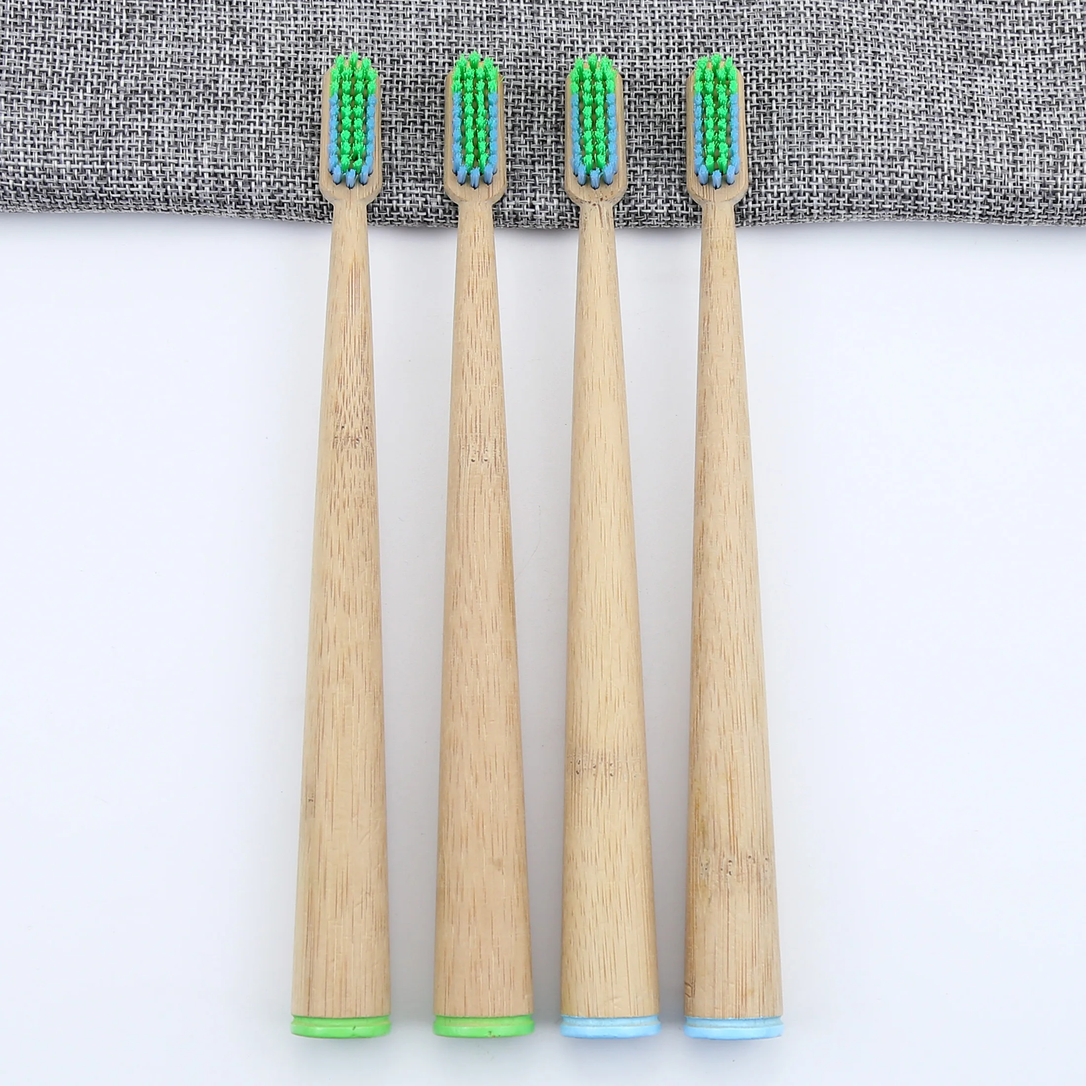 
conical handle biodegradable eco bamboo toothbrush with wavy end-rounded Dupont Nylon 612 super soft bristles 