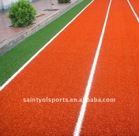 Красная и красочная синтетическая трава для бега
