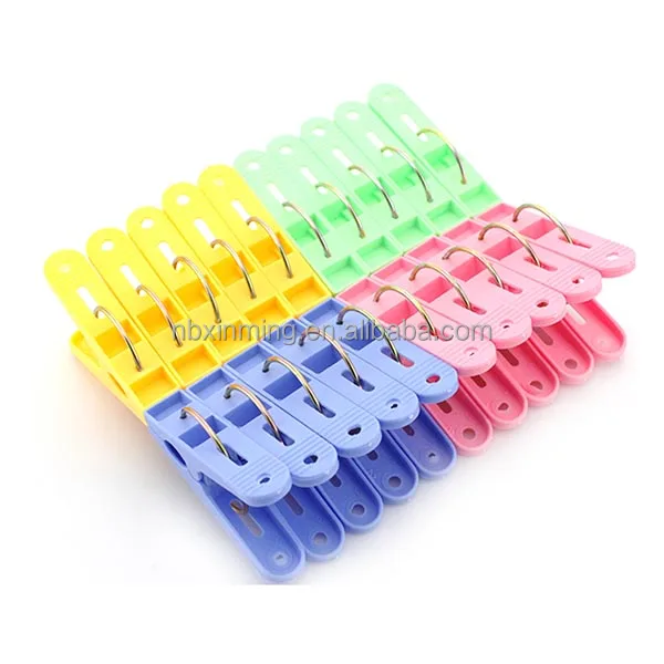 Round plastic clothes peg with hook