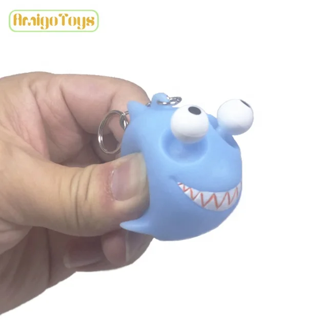 
OEM/ODM PVC Squeezable Eyes Popping Action Figure Toys Dinosaur Promotion Keychain promotional gift 