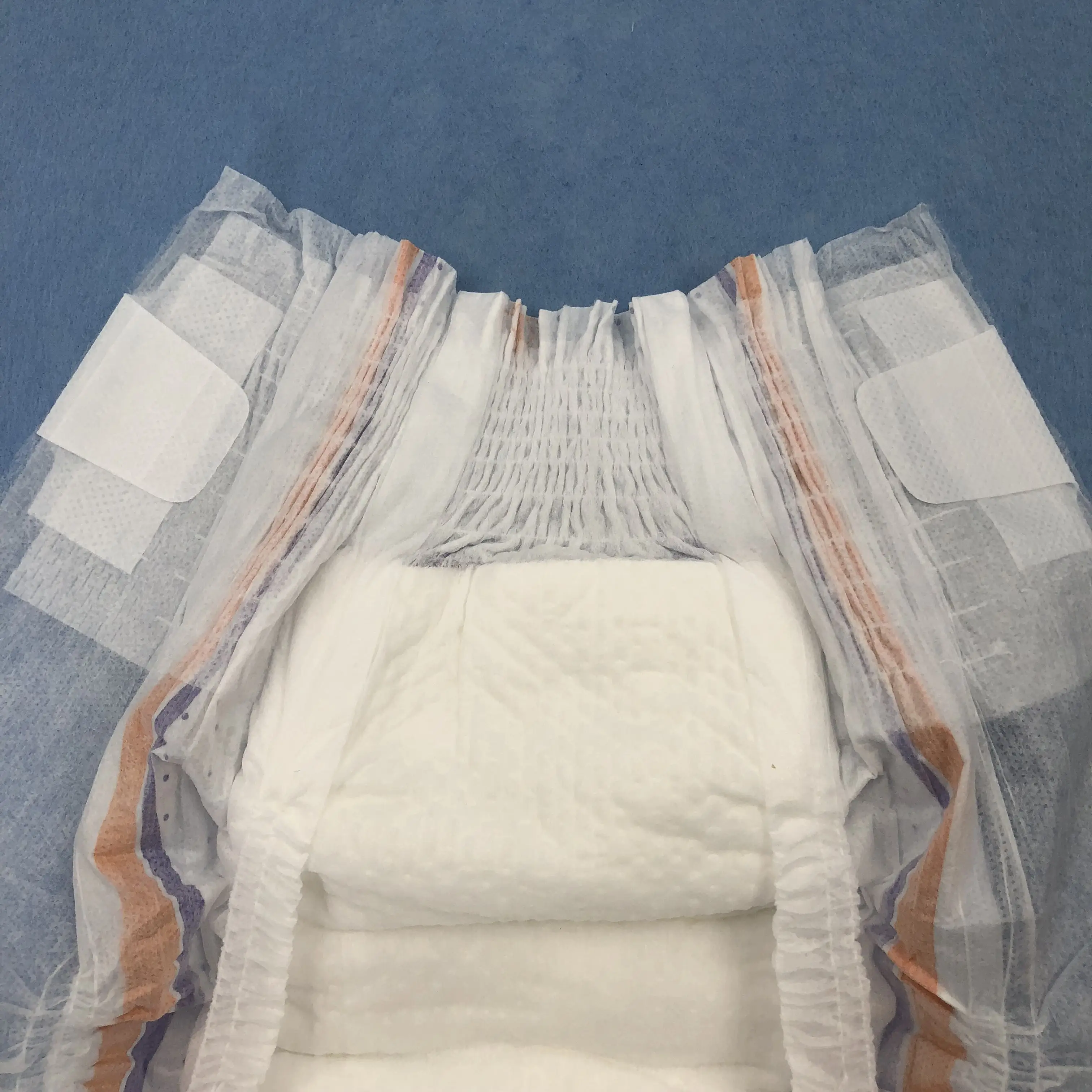 Low price disposable magic tape elastic waist band baby diapers manufacturer with OEM service