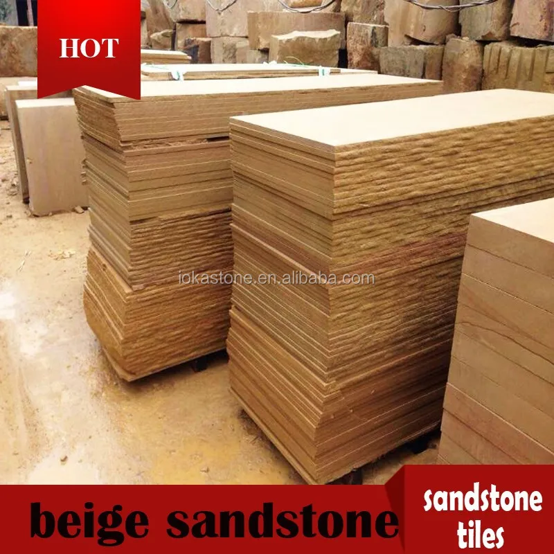 Желтые строительные плиты из песчаника