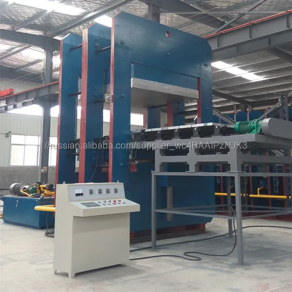 Vulcanizing machine and rail shaft