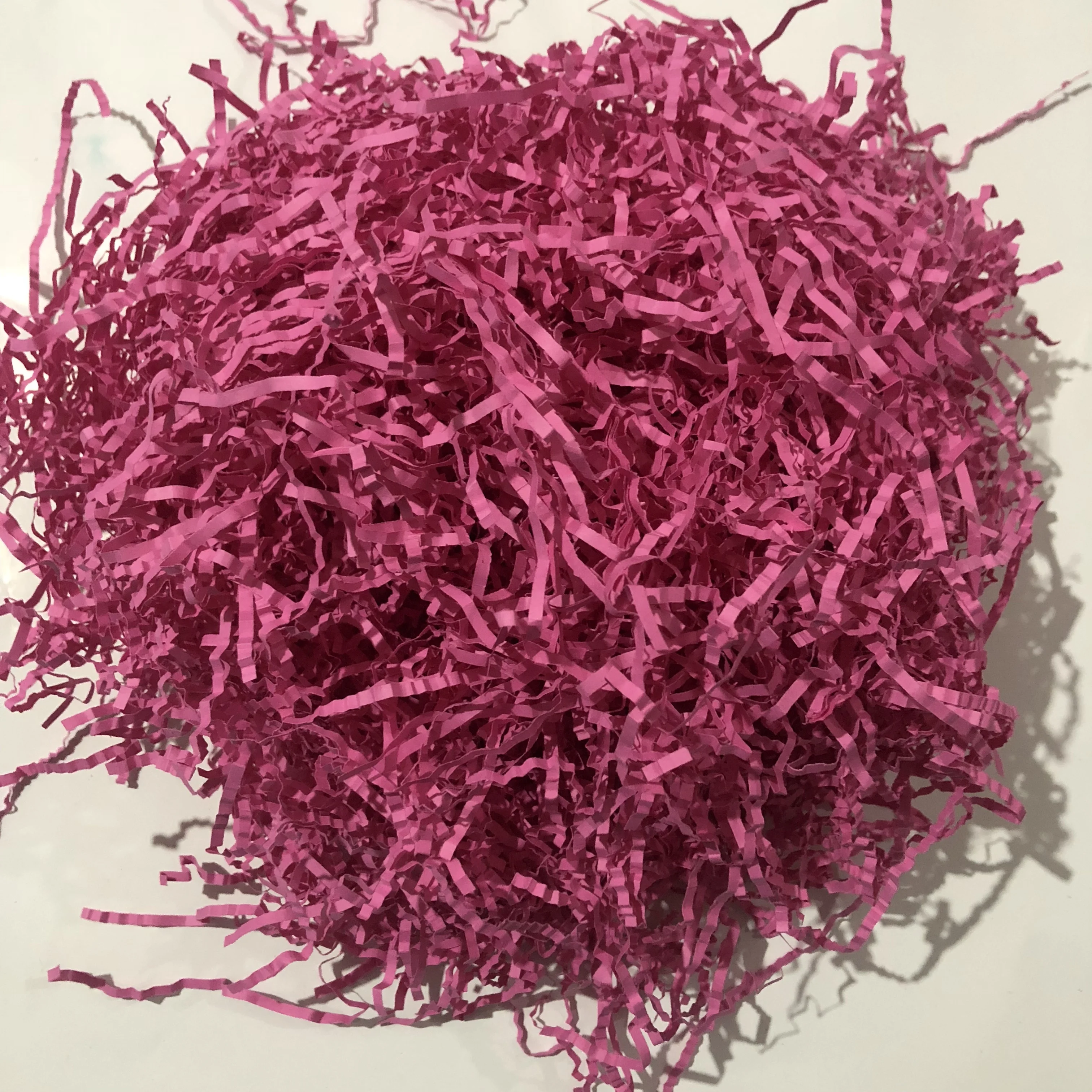 Rose color shredded paper as filler