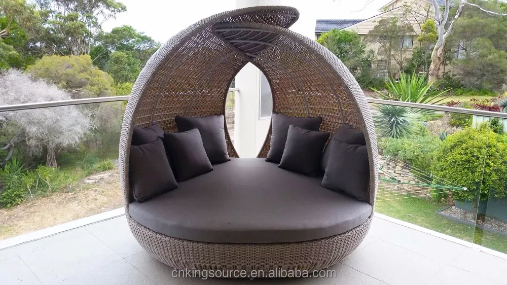 Tropical round cocoon shaped outdoor sunbed with rattan covered and canopy beach lounge