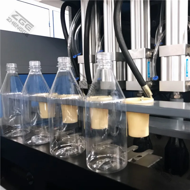 2000BPH 500ml 750ml 1500ml 4 Cavity Plastic Mineral Water Pet Bottle Plastic Making Machine