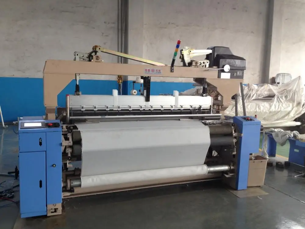 Textile weaving machine high speed air jet loom