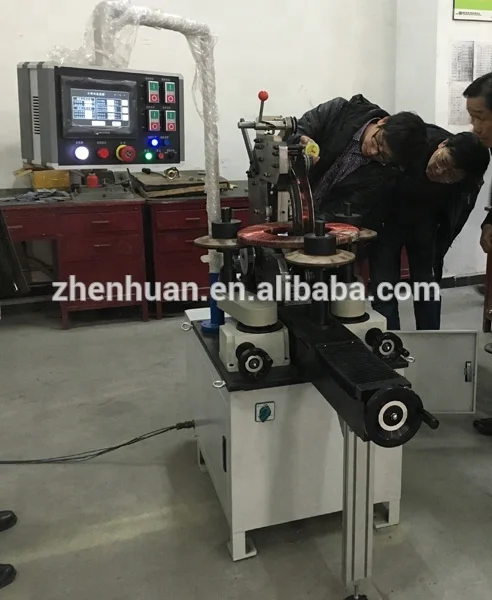 Dual-station toroidal coil winding machine and insulation tapping machine