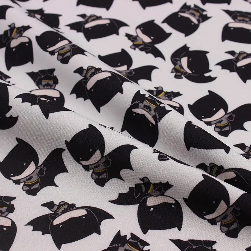In stock twill peach skin fabric with cartoon batman print for children jacket