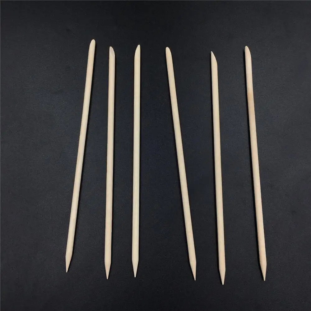 Nail art orange manicure wood stick