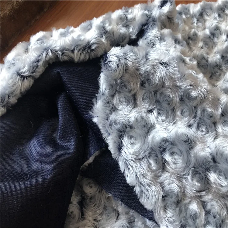 
100% Polyester Knitted Embossed Rose Flower Pattern Swirl back printed PV Plush Fabric 