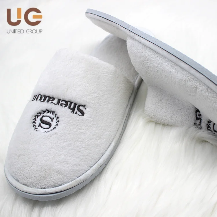 Yangzhou United Factory Latest Design Brand Hotel Use White Cotton Coral Velvet Fabric Custom Logo Cheap Wholesale Slippers