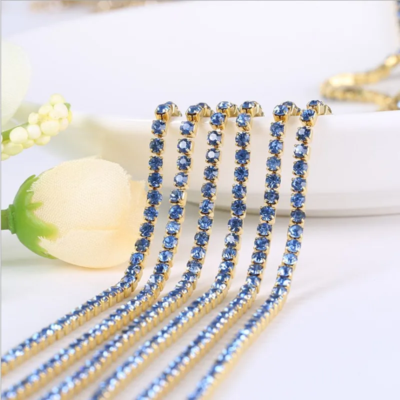 
Light sapphire rhinestone Trims for clothing in rolls/ rhinestone cup chain for clothing trimming 