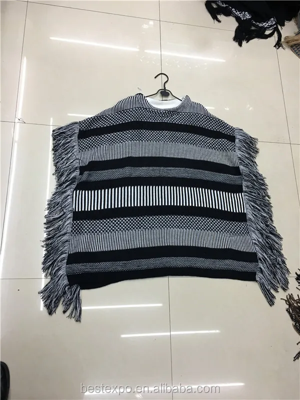 
wholesale latest sweater designs for girls knitted turtleneck poncho with fringe guangzhou factory coat 