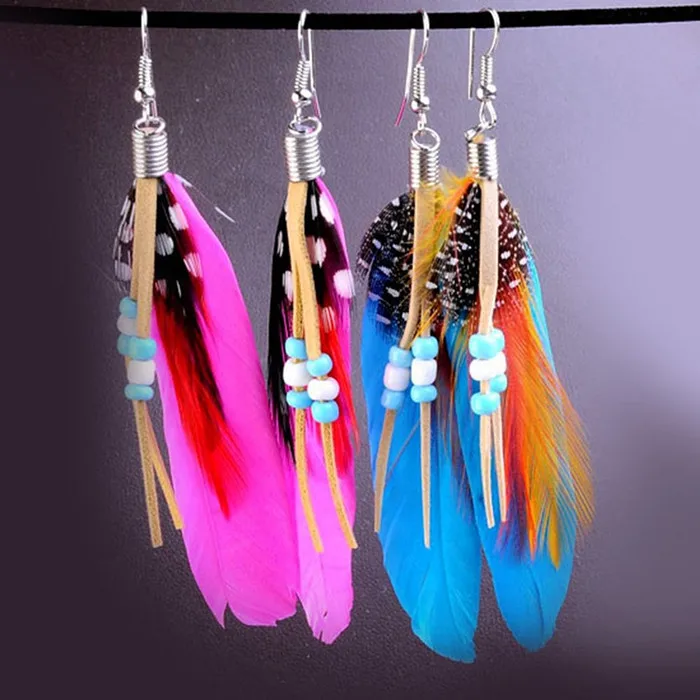 China wholesale long feather wood beads drop earrings for sale