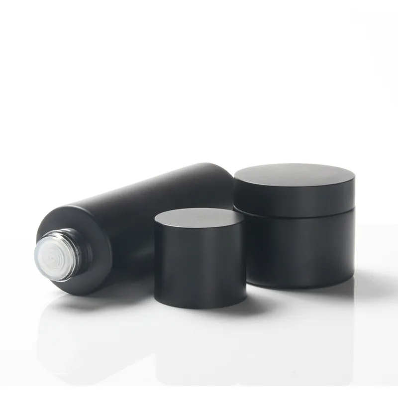 OEM ODM Frosted black cosmetic jar set glass bottle skin care packaging container