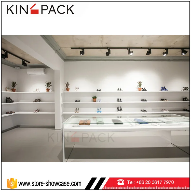 Shoe cabinet of small shoes shop interior design with mirrors wall shoe cabinet