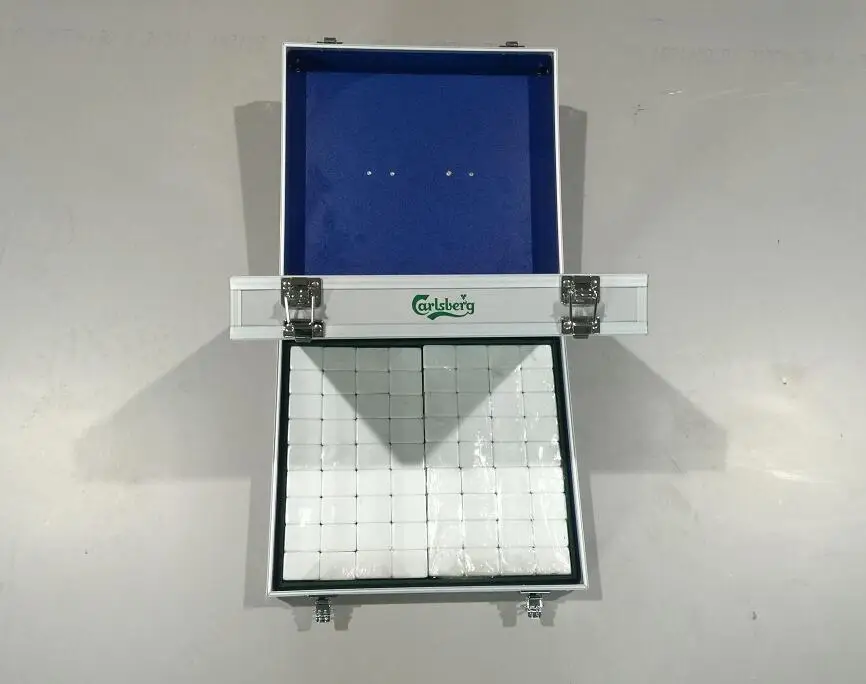 
double aluminum storage case with mahjong in it 