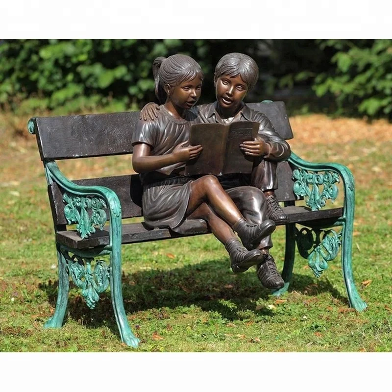 modern outdoor decoration bronze girl and boy reading on bench sculpture