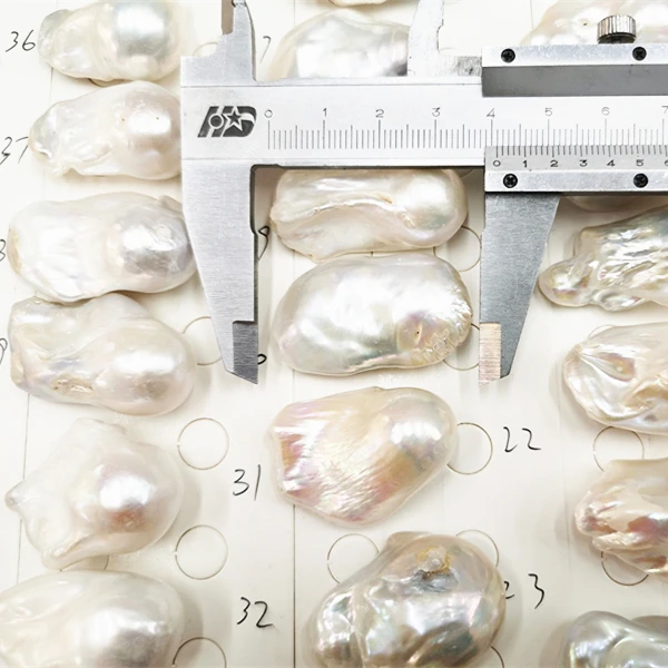 
Wholesale 30-40mm Long Big Nucleated Fireball Pearl Undrilled Natural Real Freshwater Baroque Pearl 