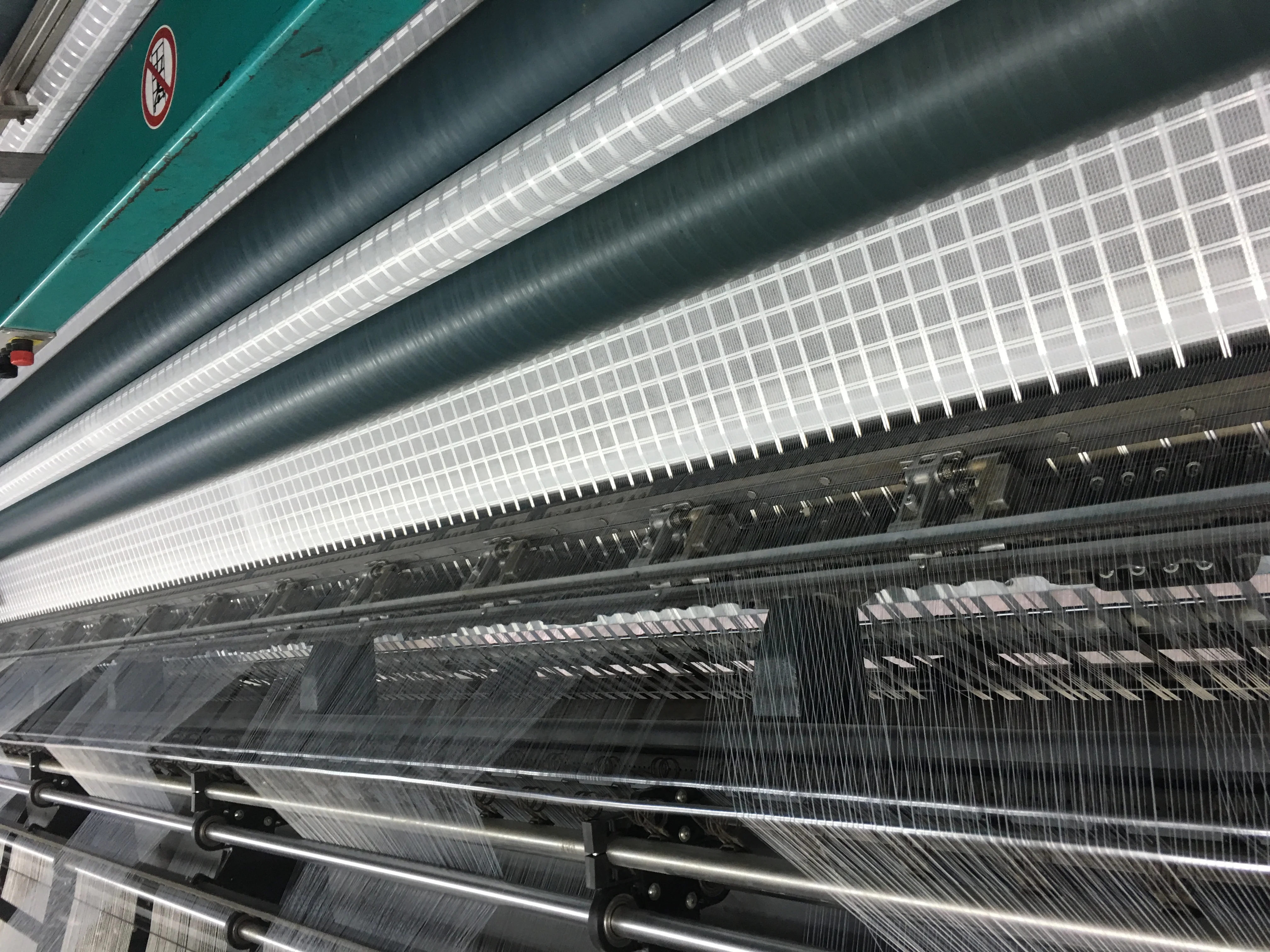 Knitted Polyester Geogrid Composite Nonwoven Geotextile For Road Paving Material