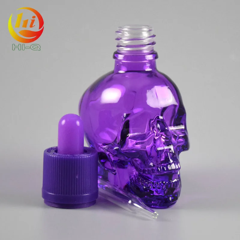 unique shape glass liquid bottle 15ml 30ml 50ml clear skull glass dropper bottle