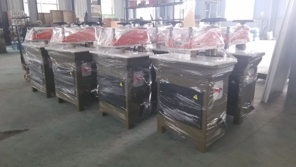 Hydraulic swing arm flip flops cutting machine