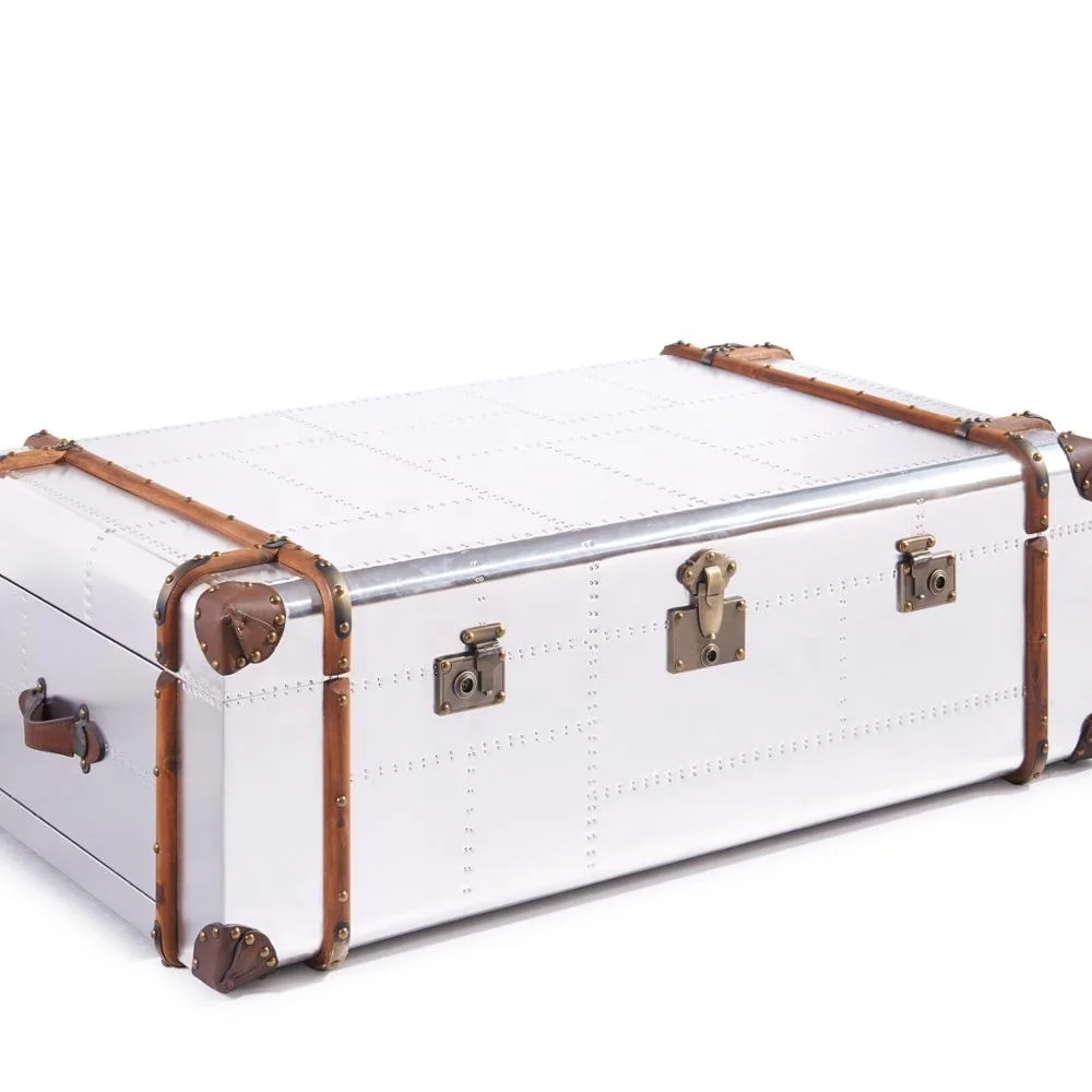 
wood trimed aviator aluminum covering old school looking coffee table 