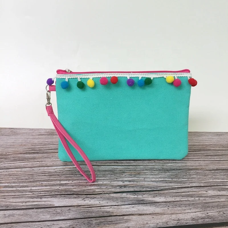 Hot selling canvas monogram good quality pom pom makeup bag cosmetic women clutch