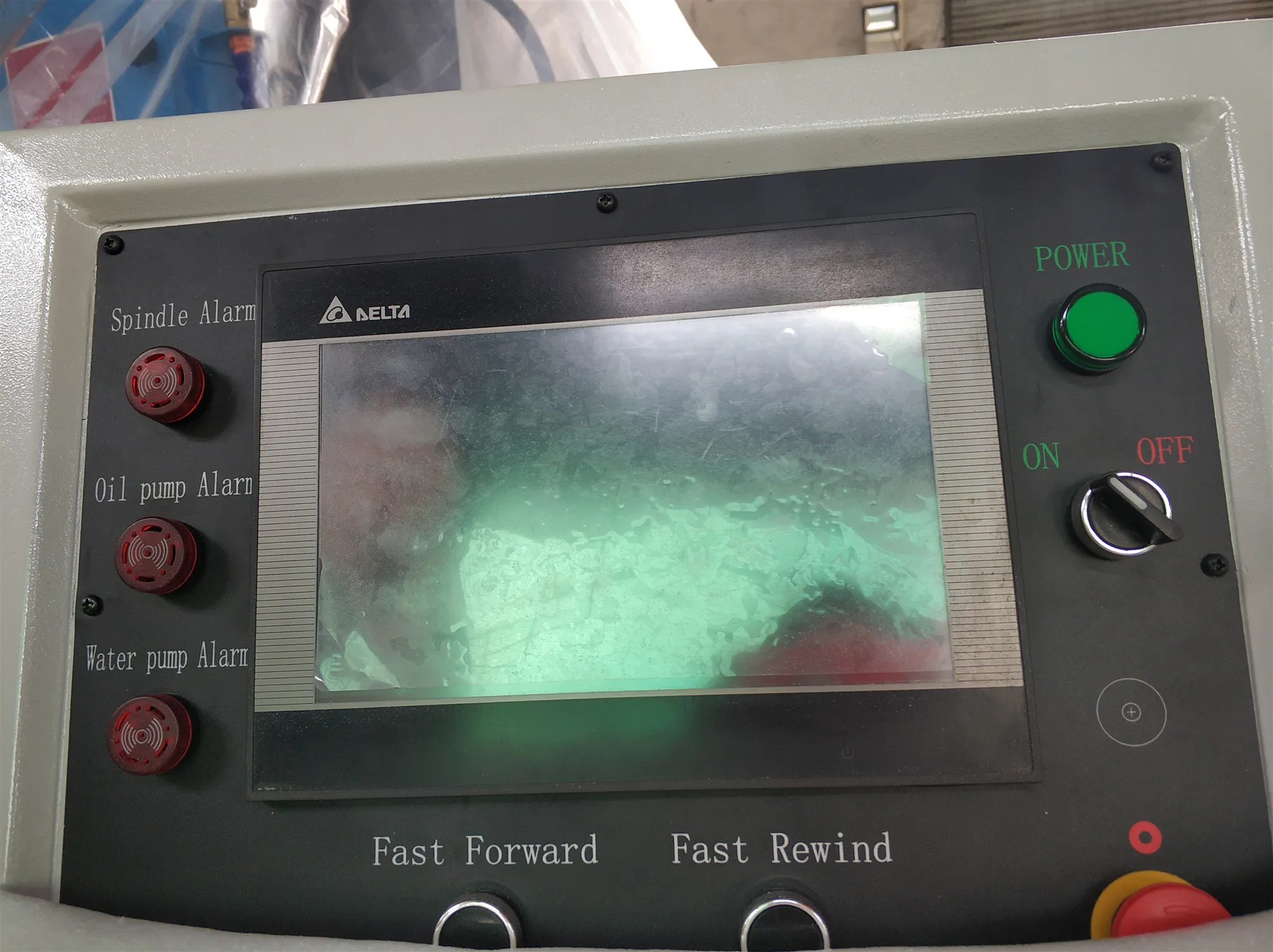 Automatic surface grinder with two-axis Delta PLC MYK1224