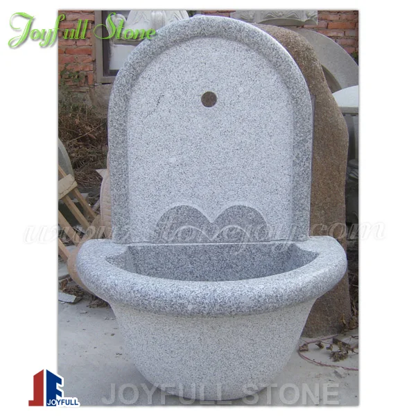 
European Carved Stone Granite Wall Fountain with fish sculpture 