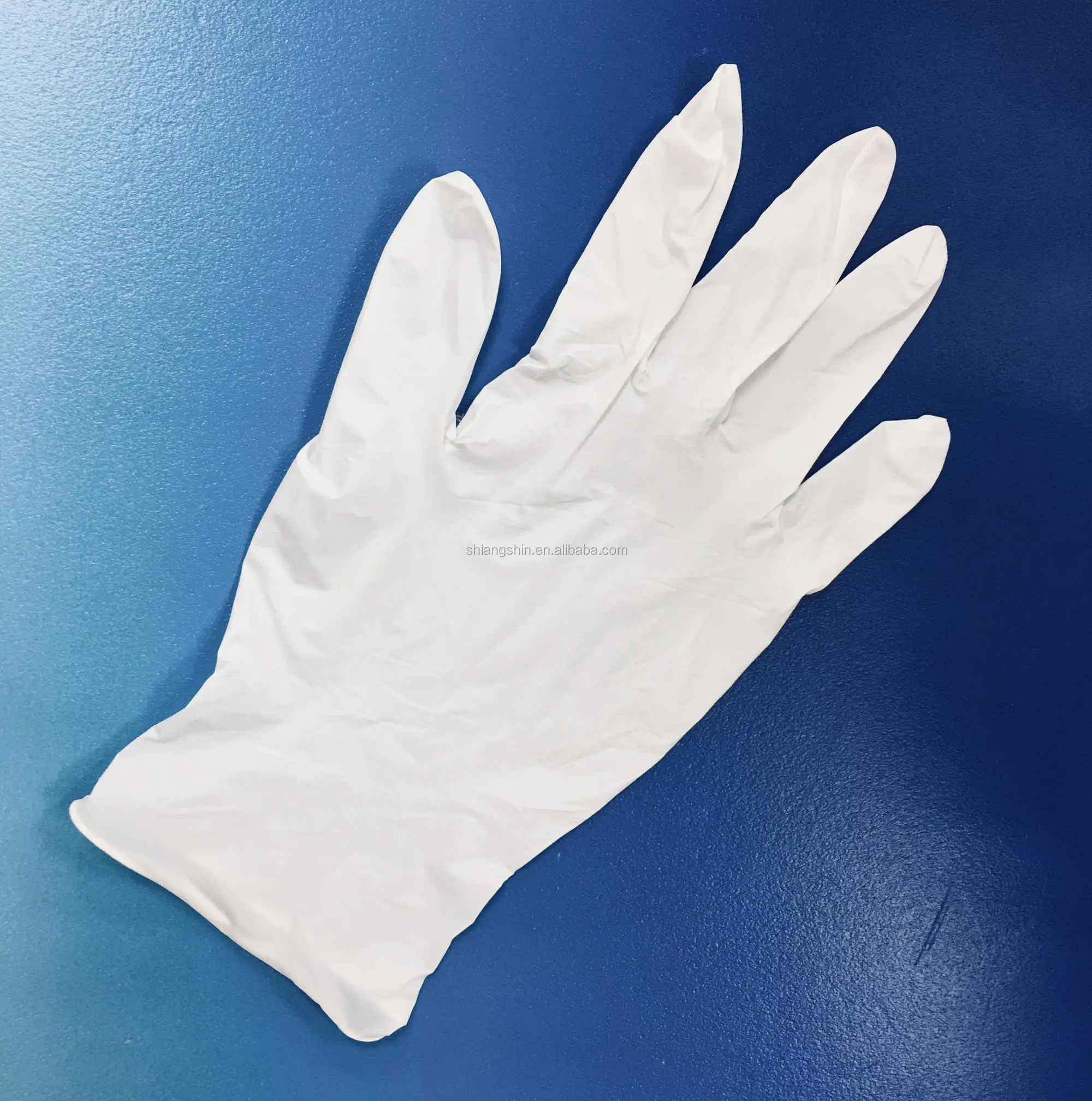 Медицинские одноразовые перчатки