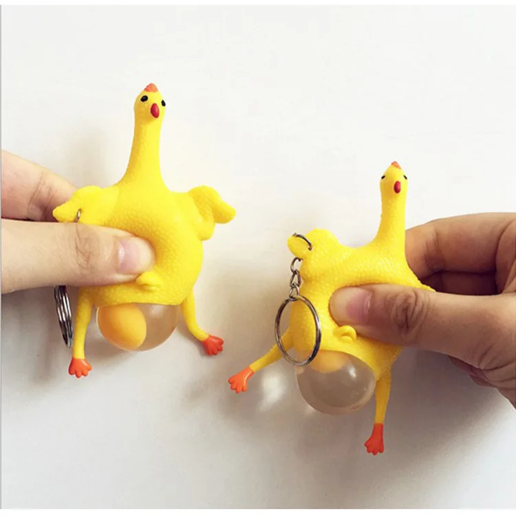 Hot sale  creative yellow chicken prank decompression funny toy rubber keychain