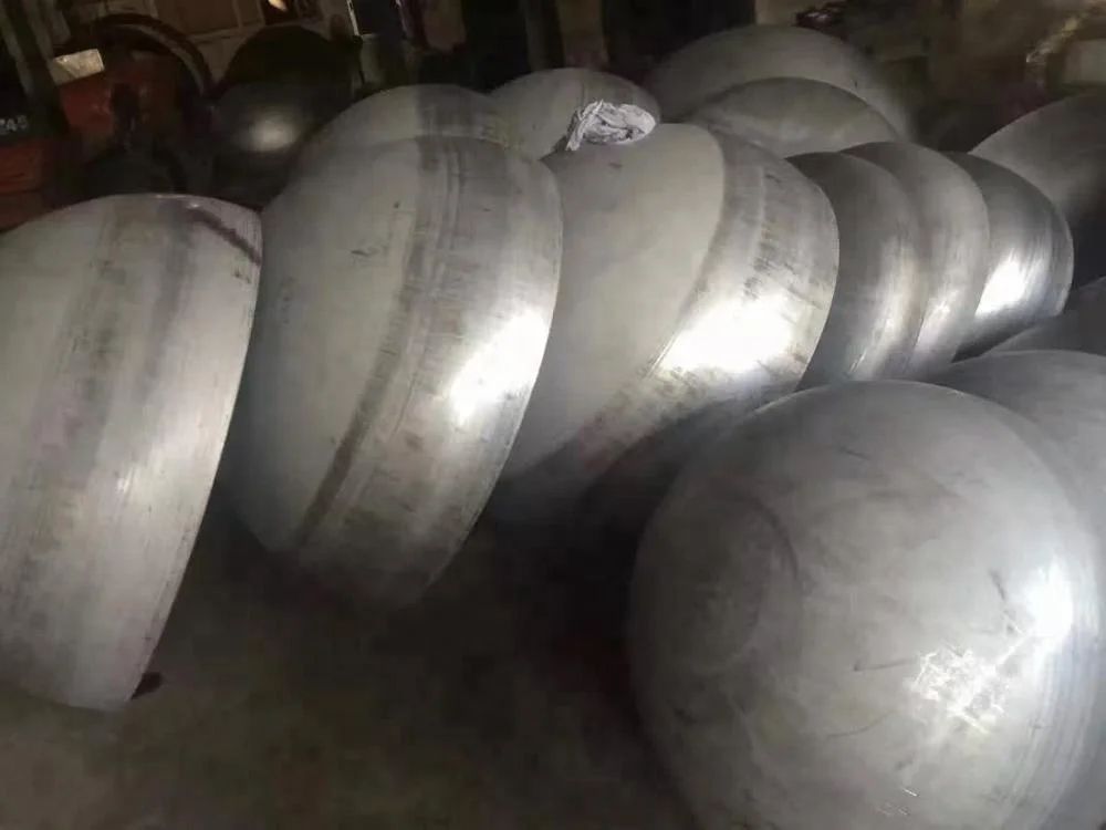 Production of large diameter hot rolled stainless steel pipes