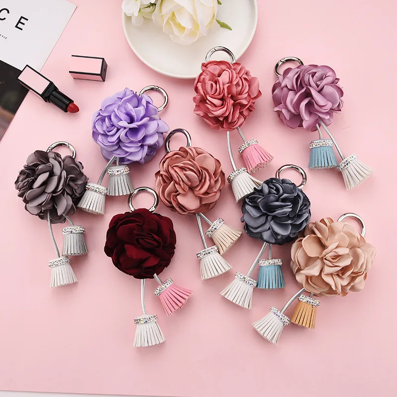2021 Korean version of the hanging edge burning hot flower bag pendant jewelry female diamond PU tassel alloy key chain manufacturers