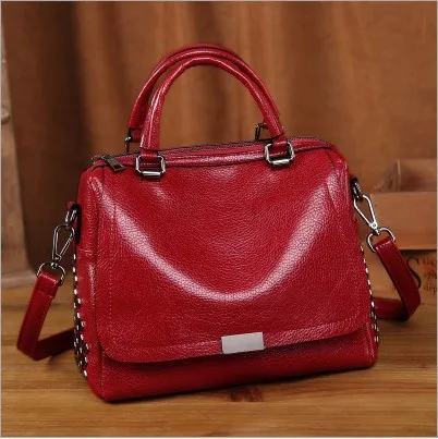 generation of handbags new European and American Boston pillow bag retro fashion handbag rivet Messenger shoulder bag